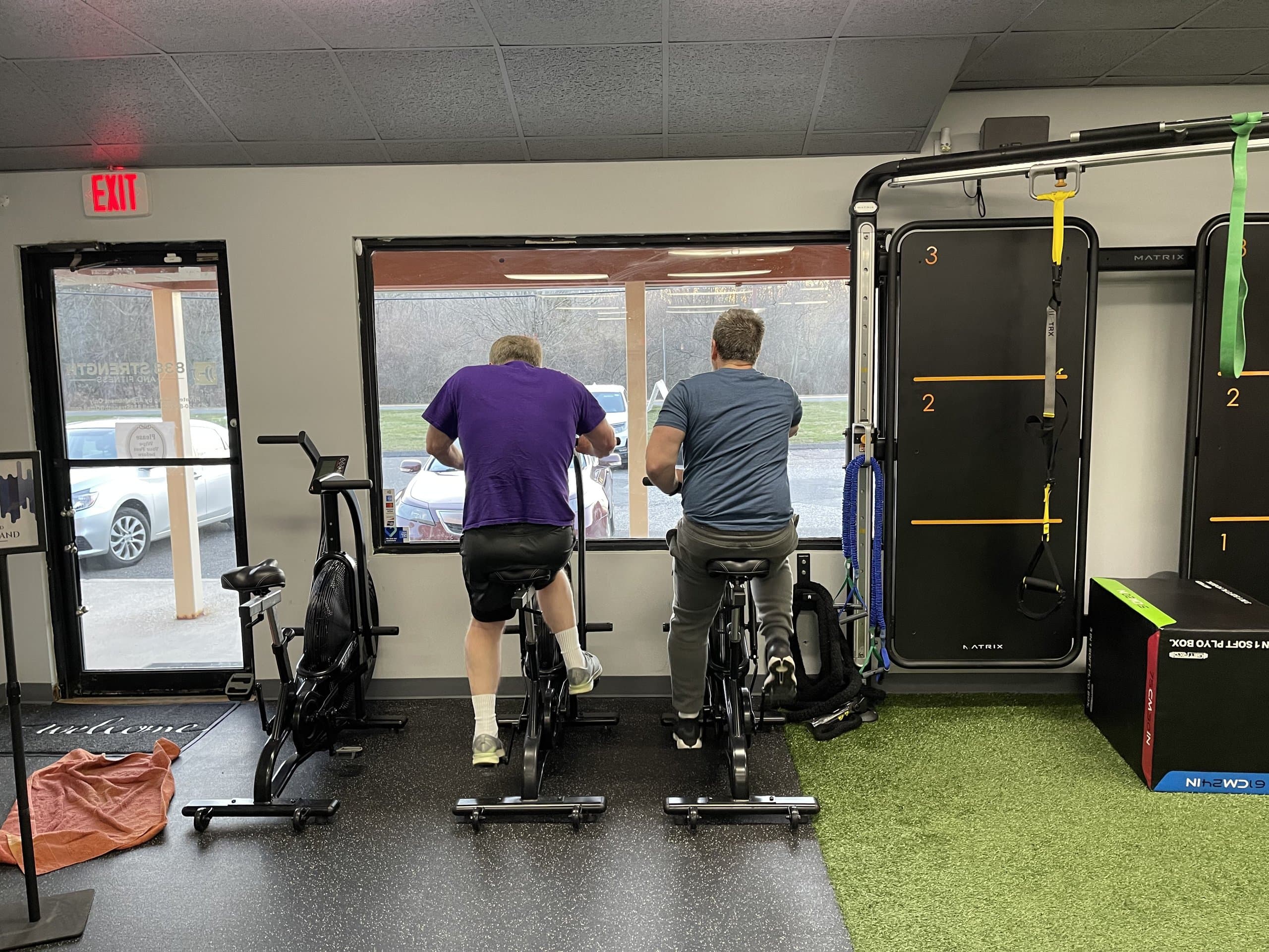 Members using the stationary bikes at 838 Strength and Fitness in Monroe, CT