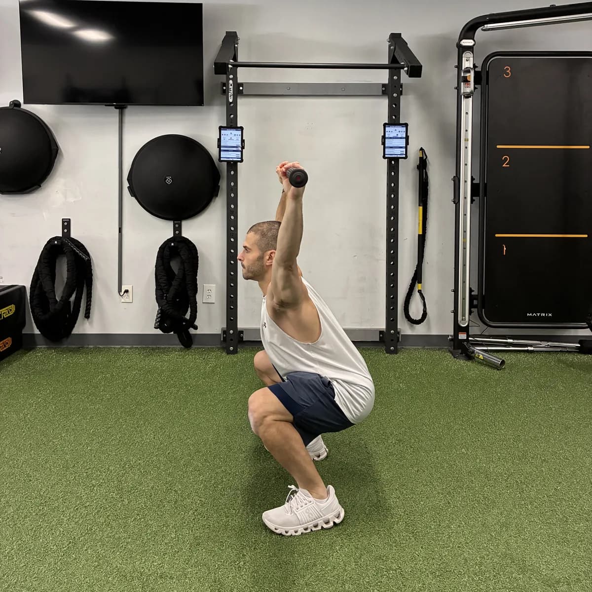 Overhead squat assessment, bottom position, at 838 Strength and Fitness