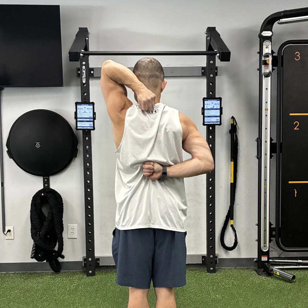 Shoulder mobility test, left side, at 838 Strength and Fitness