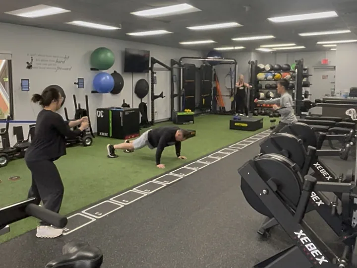 Members training in a semi-private session at 838 Strength and Fitness in Monroe, CT